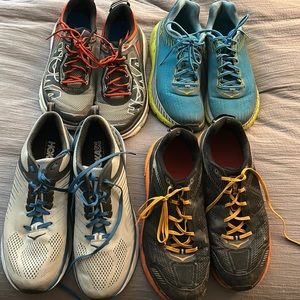 4 pairs of Hoka running shoes